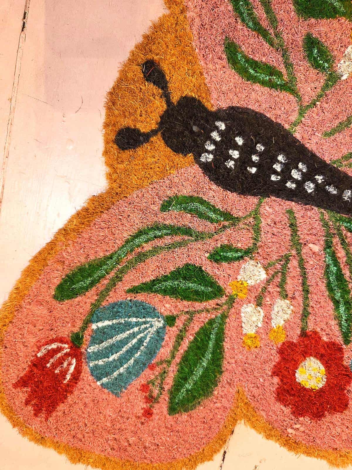 Dørmåtte formet som en sød sommerfugl - detaljer