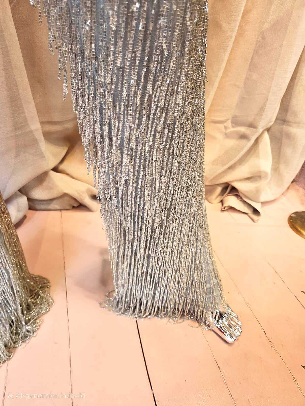 Frynsejumpsuit - detaljer på ben