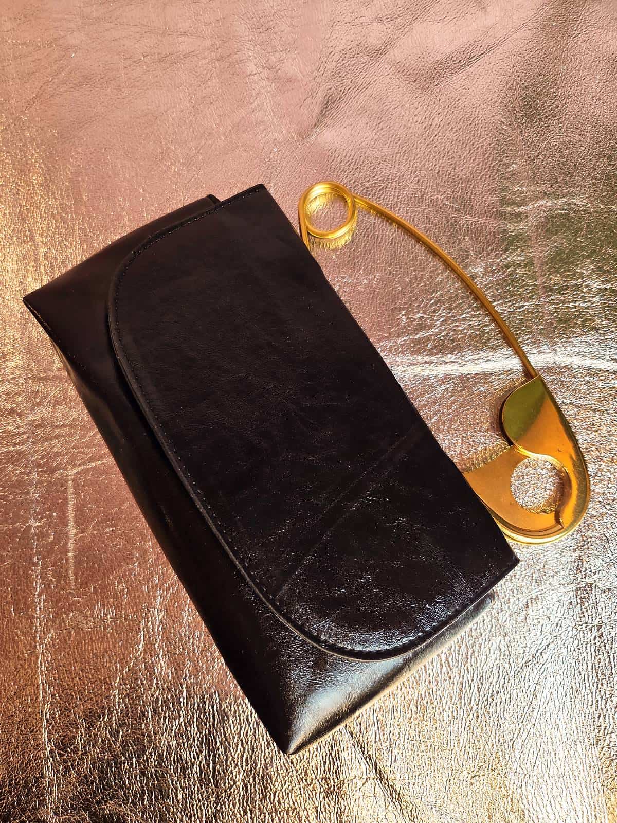 clutch med sikkerhedsnål håndtag