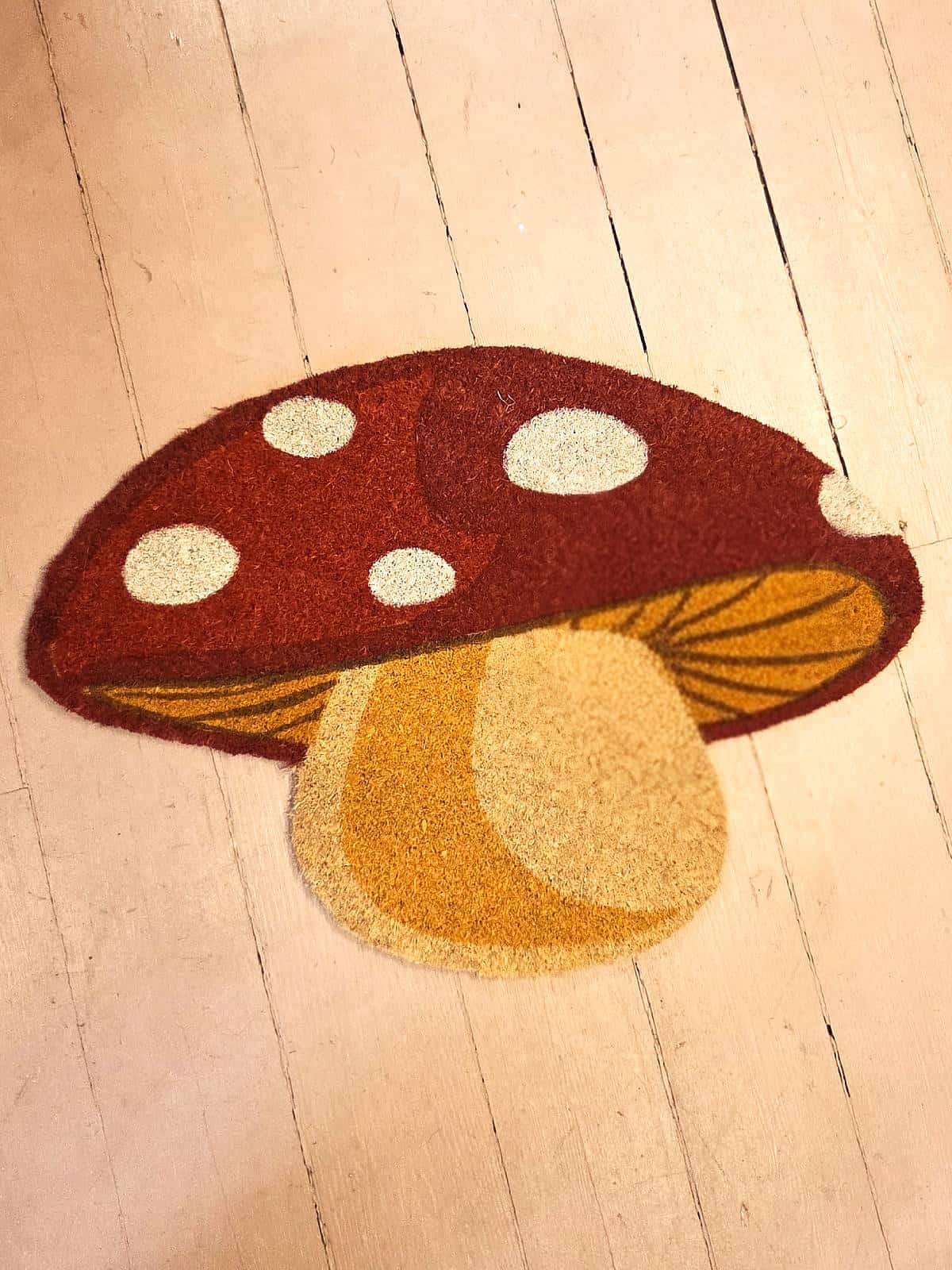 Dørmåtte formet som en sød fluesvamp