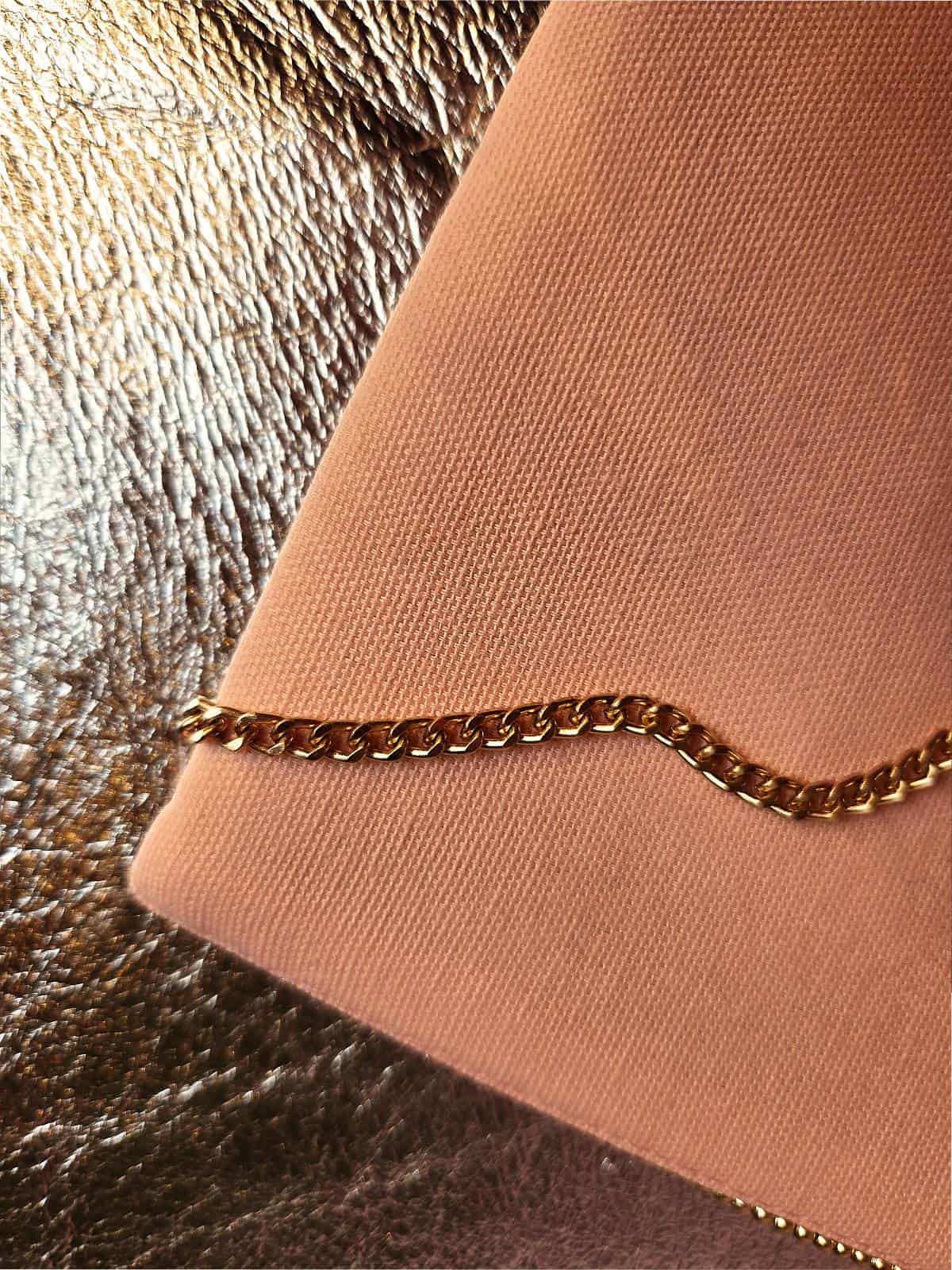 perleclutch med øjne - rosa og blå - bagside