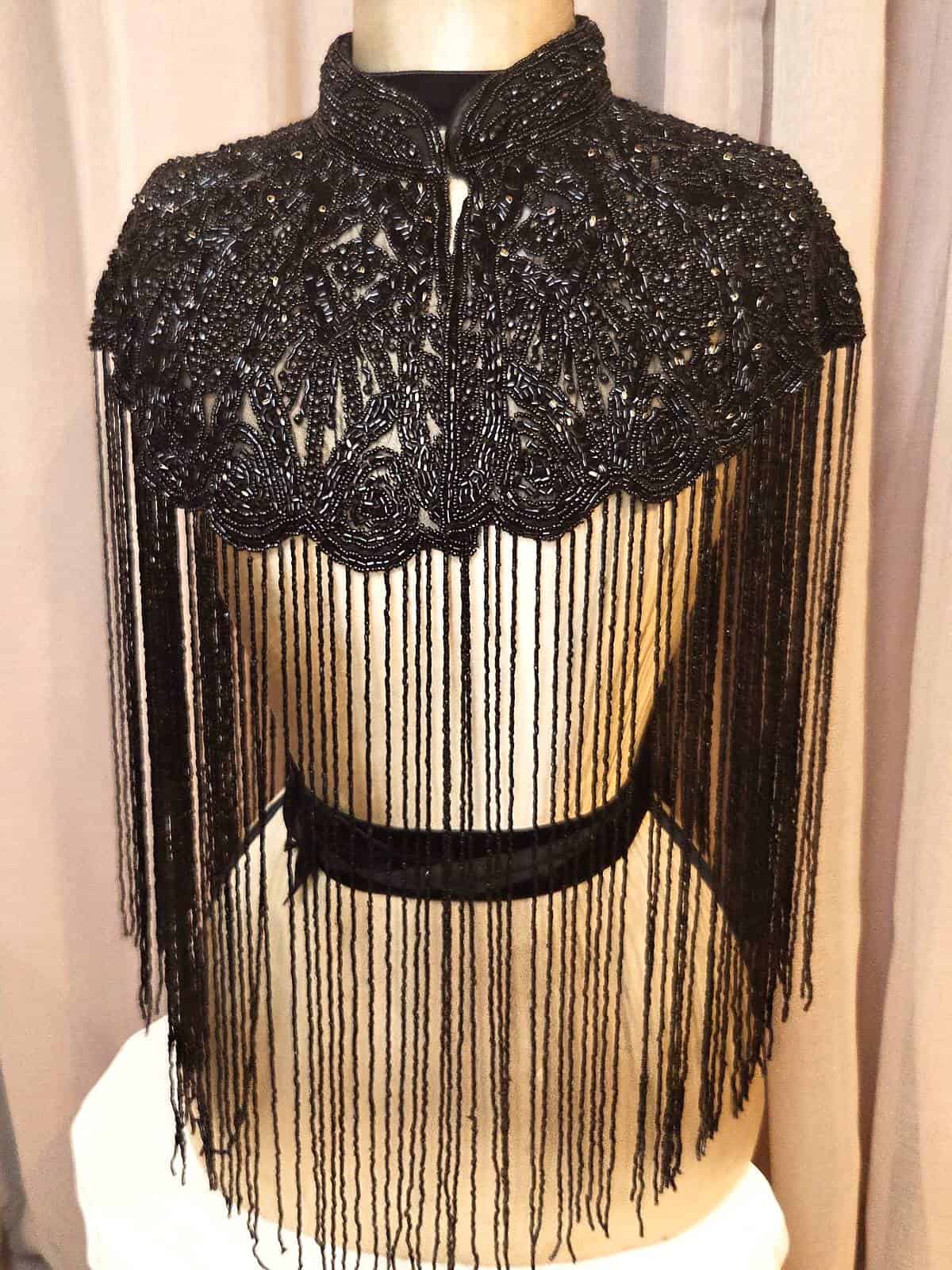 Perlekappe sort - forfra