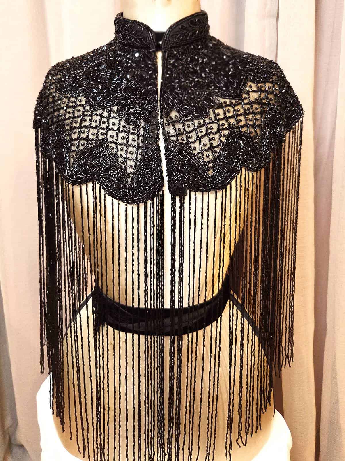 Perlekappe sort harlequin mesh - forfra