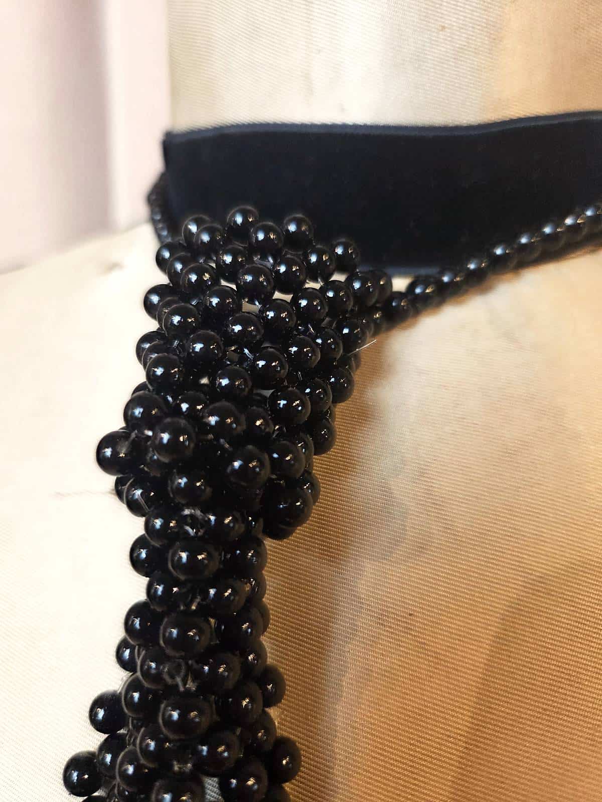 Perleslips sort - detaljer