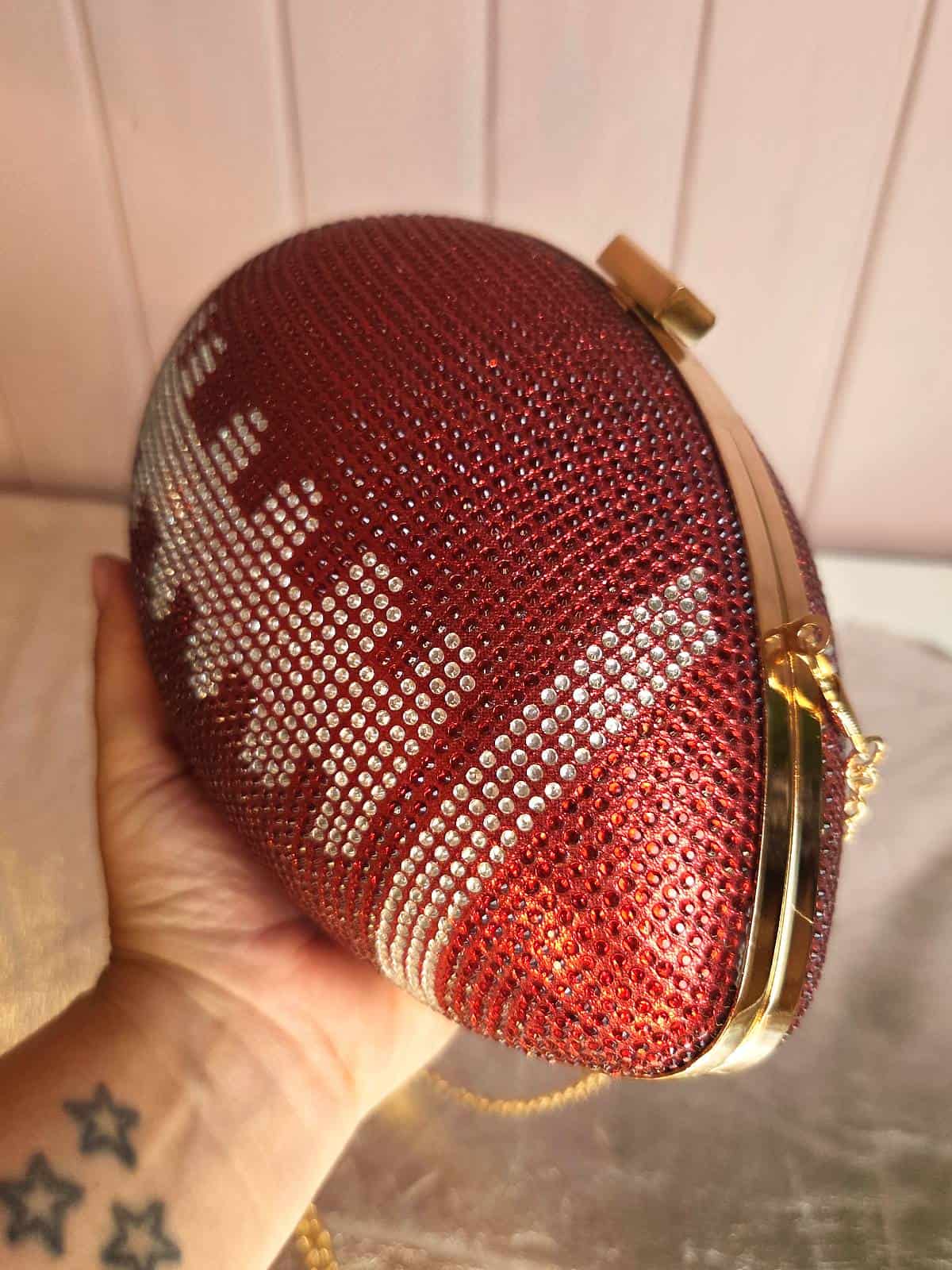 clutch amerikansk fodbold i hånd