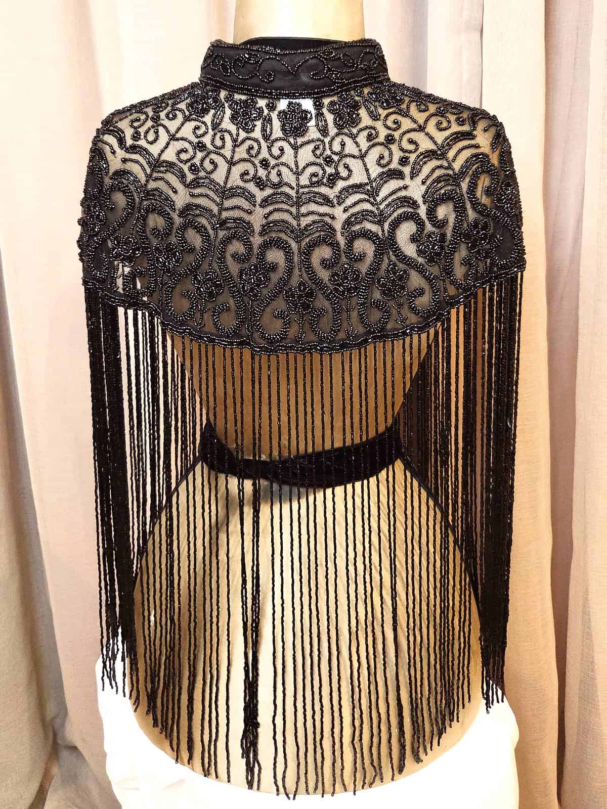 perlekappe sort mesh blomster