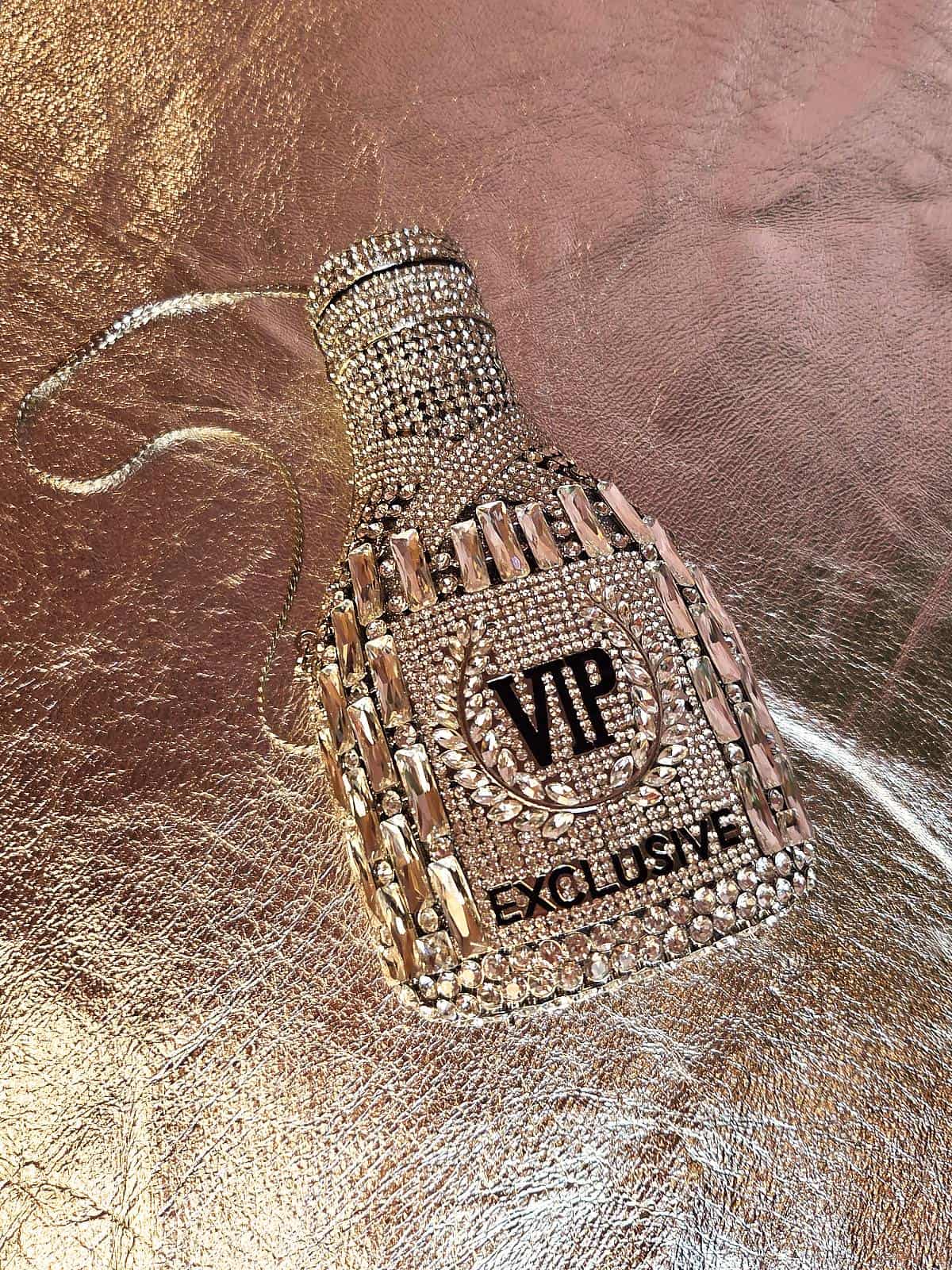 sølv vip flaske clutch