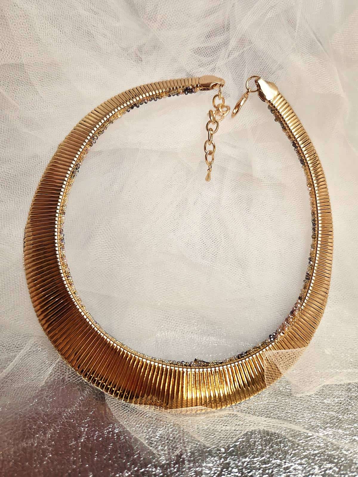 Perlekæde sneleopard - bagside