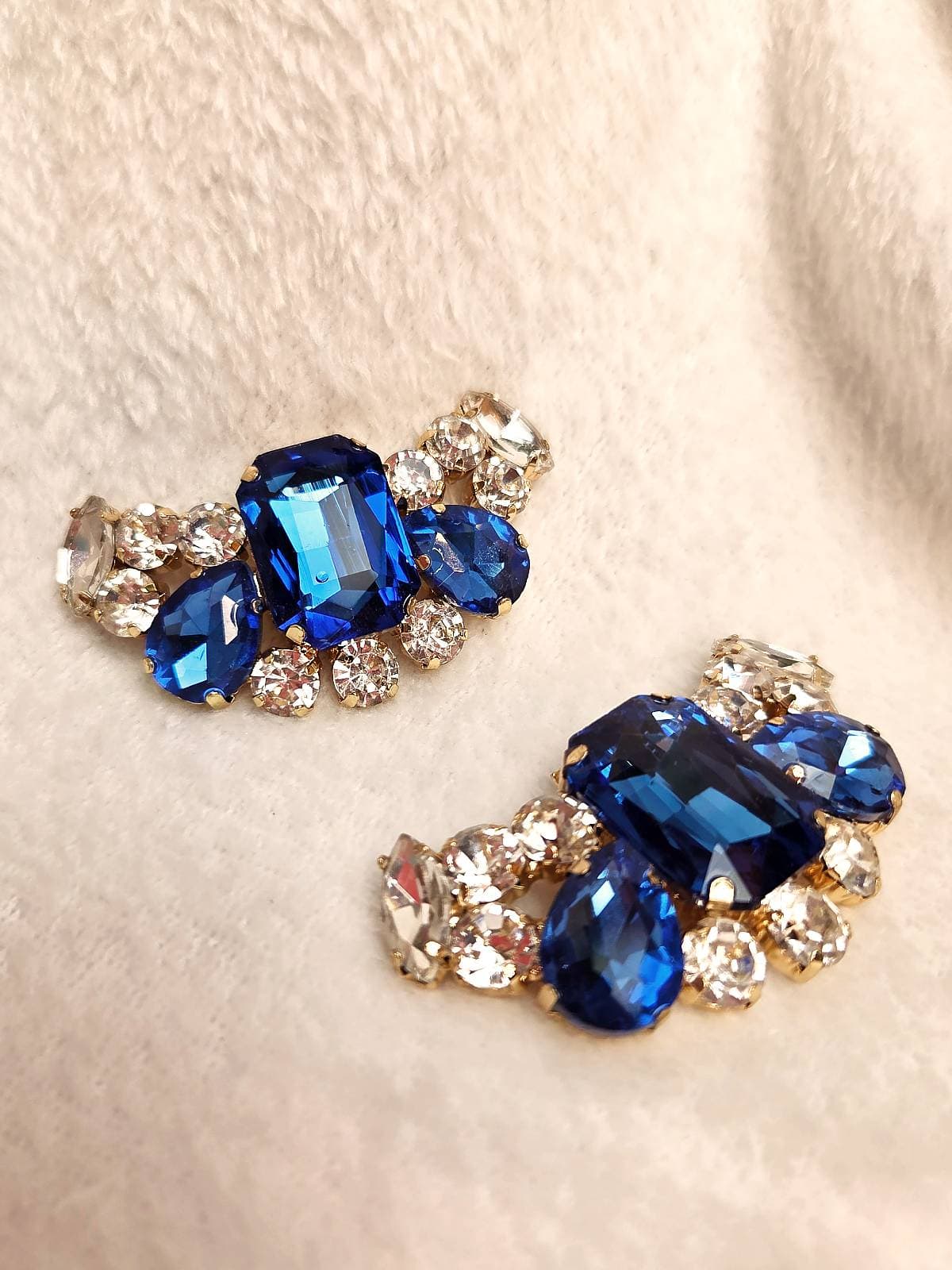 skoklips blå og hvide sten