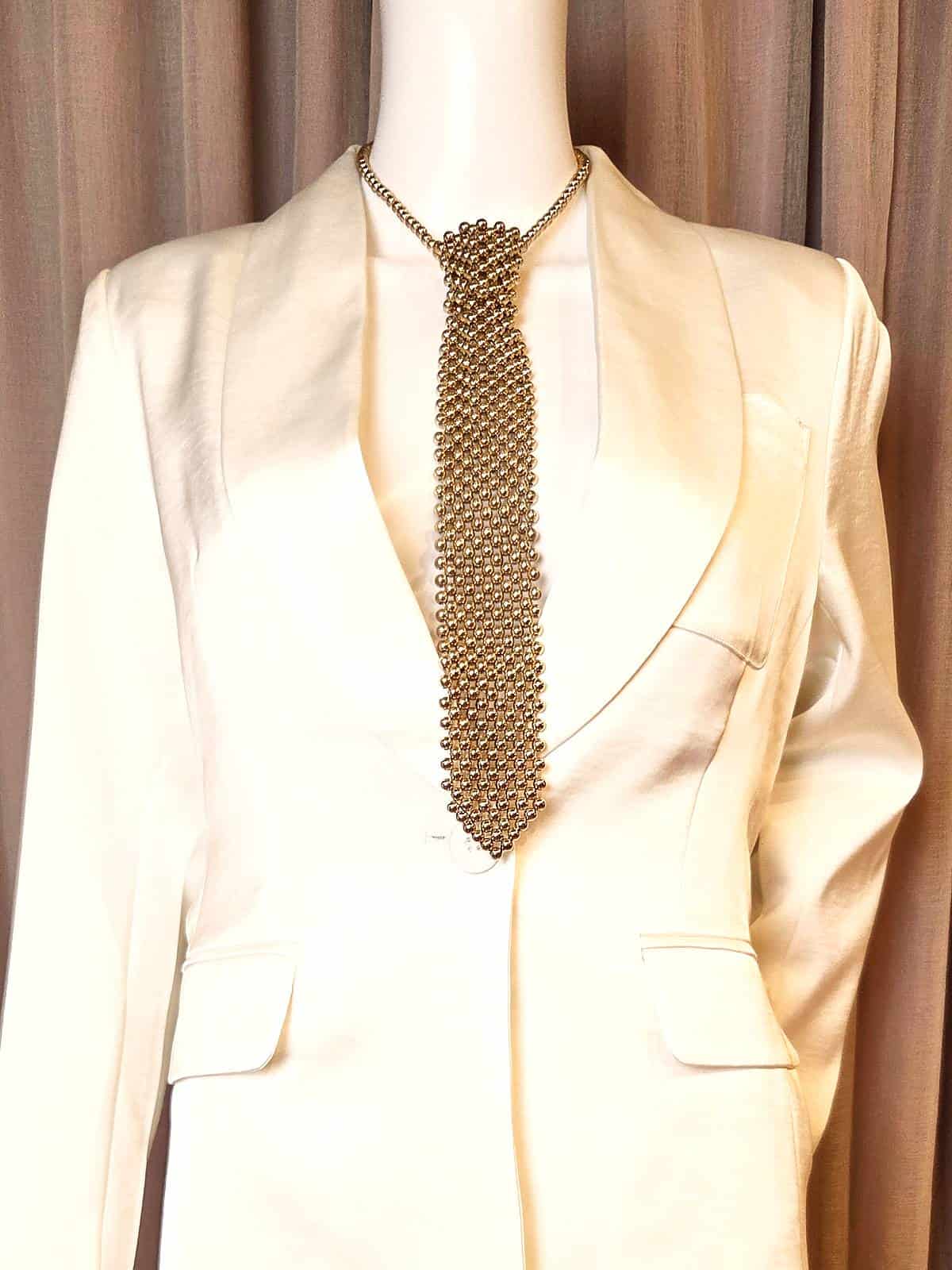 perleslips guld - over jakke