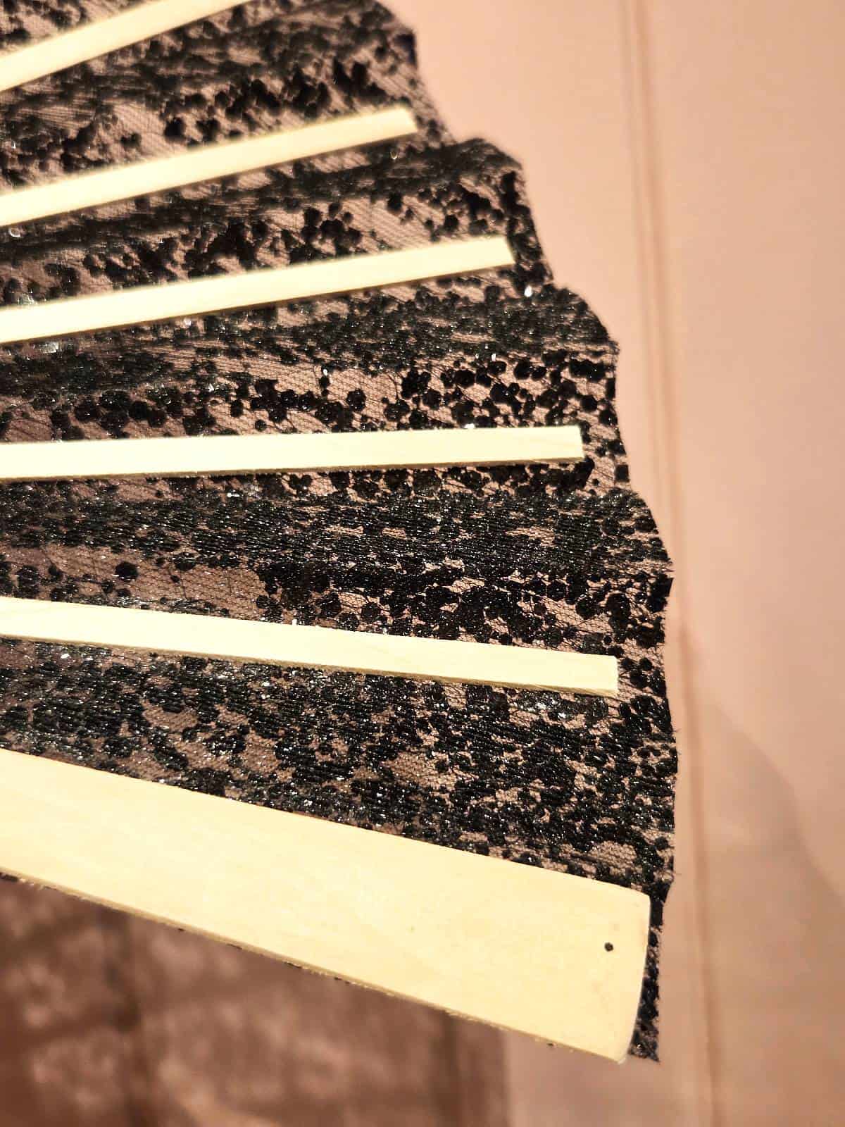 Vifte stor glitter sort - bagside