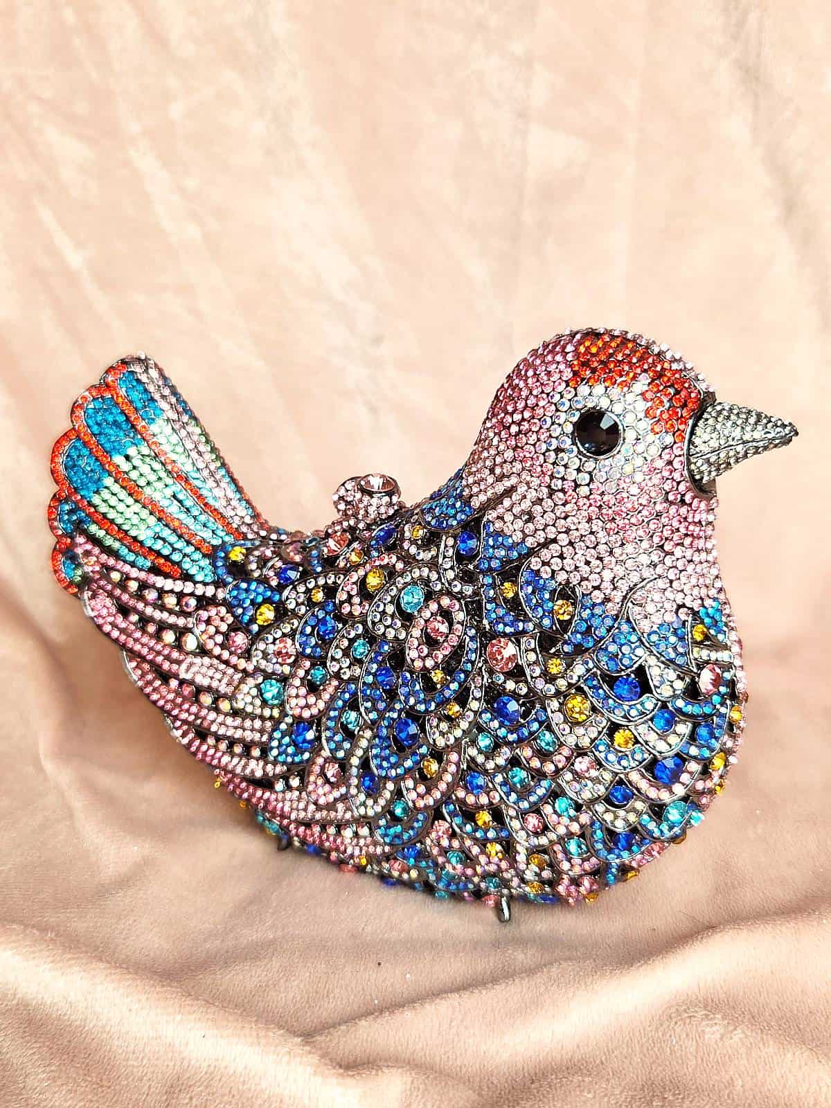 clutch simili fugl lyserød