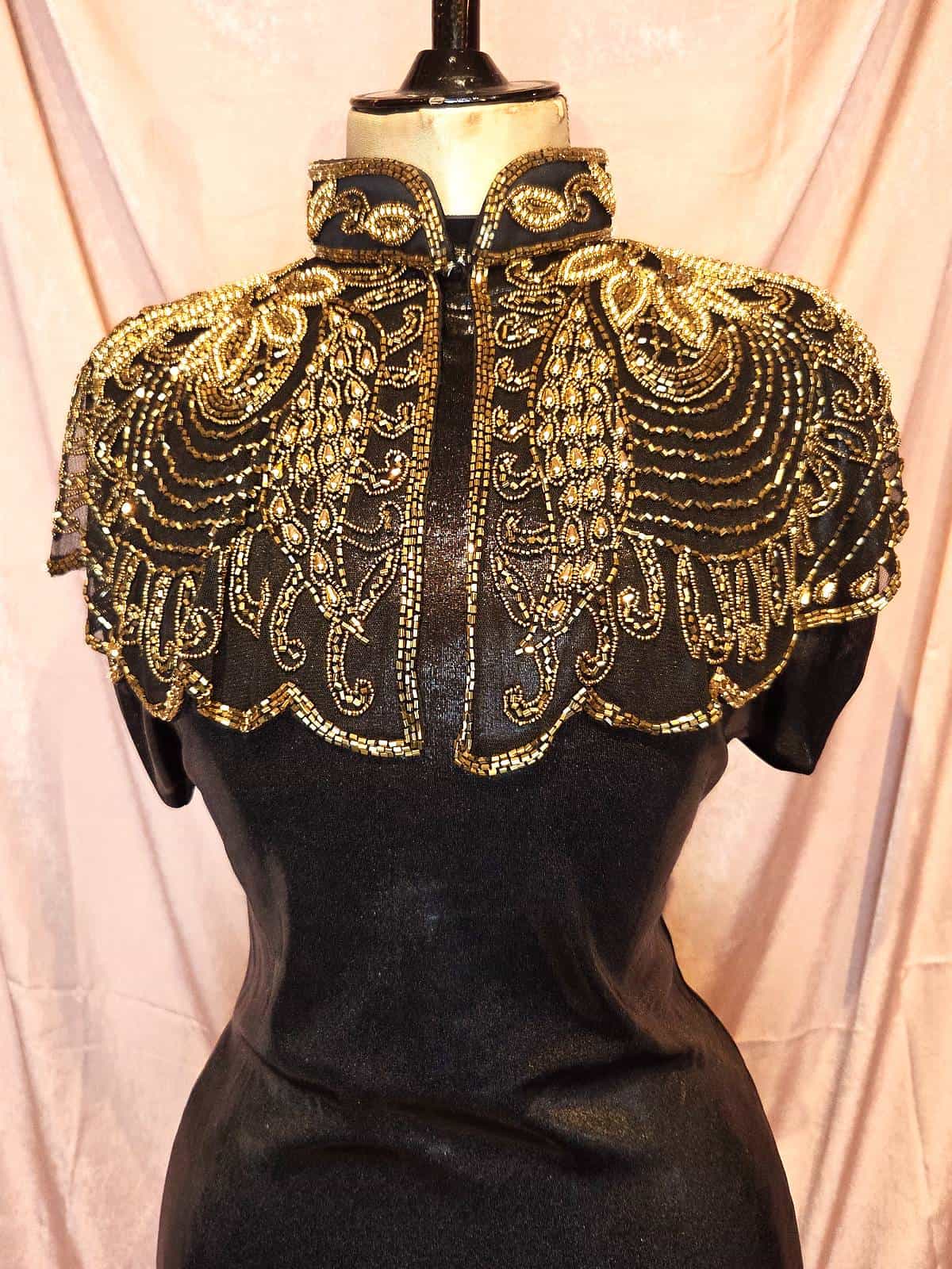 perlekappe guld og sort uden frynser - forfra