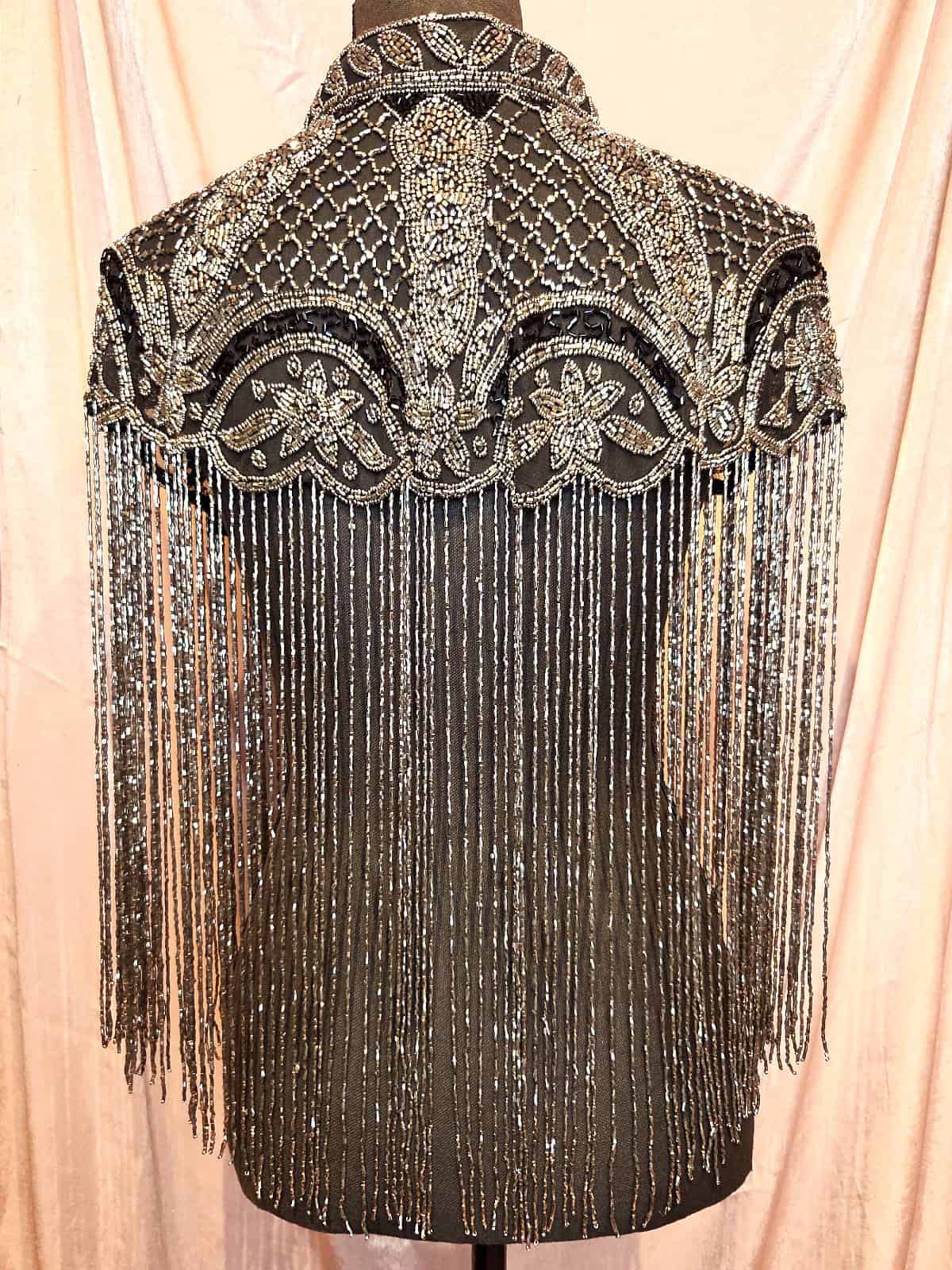 Perlekappe gunmetal ryg