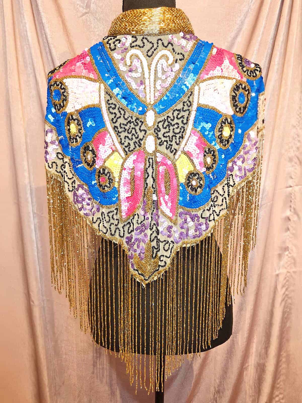 Perlekappe sommerfugl blå lyserød ryg