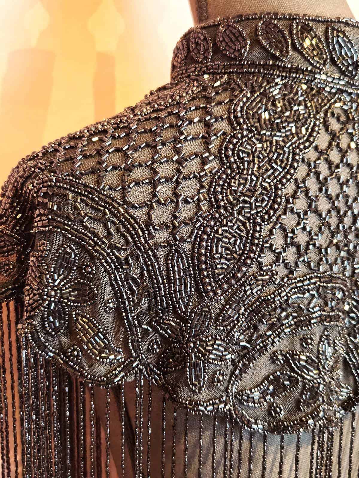 Perlekappe sort model 9 detaljer