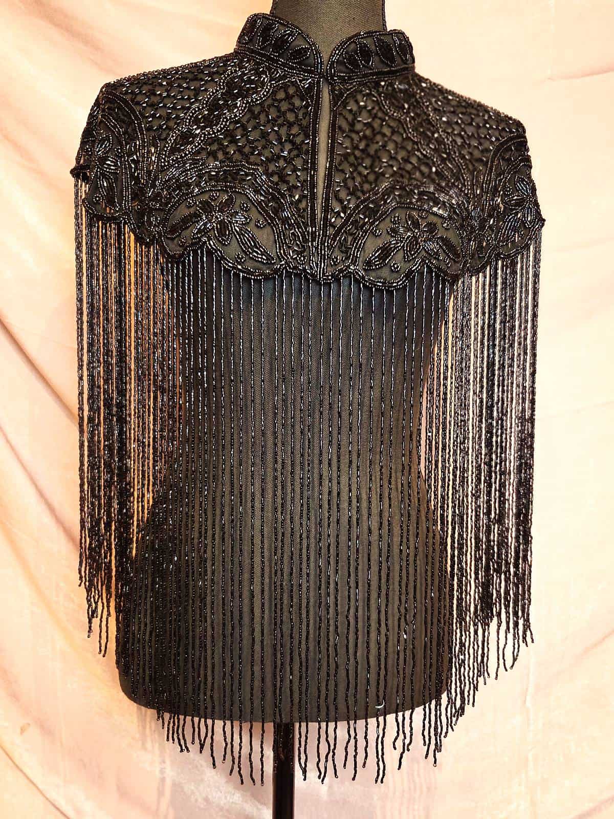 Perlekappe sort model 9 front