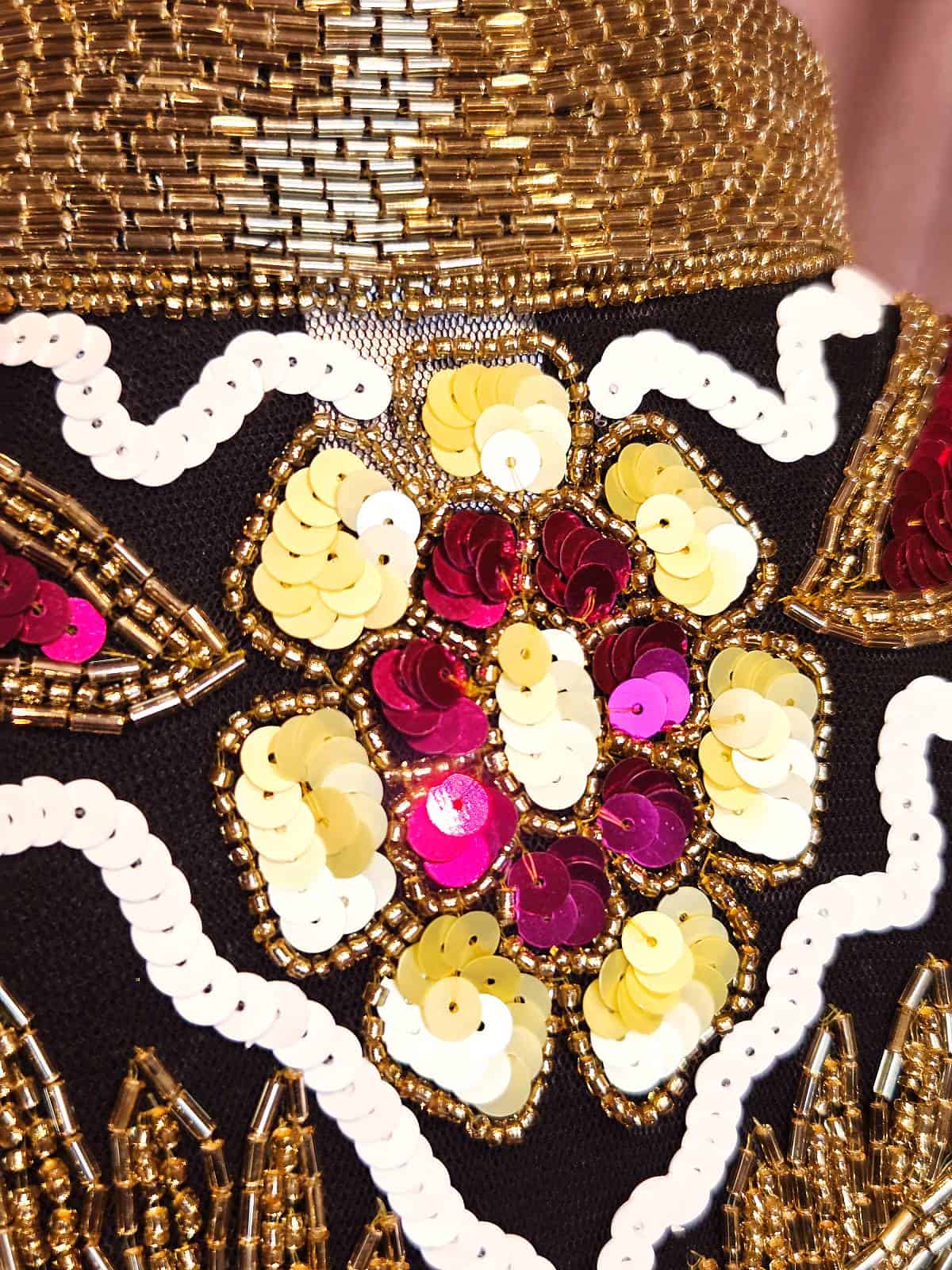 Perlekappe vinger guldpink detaljer