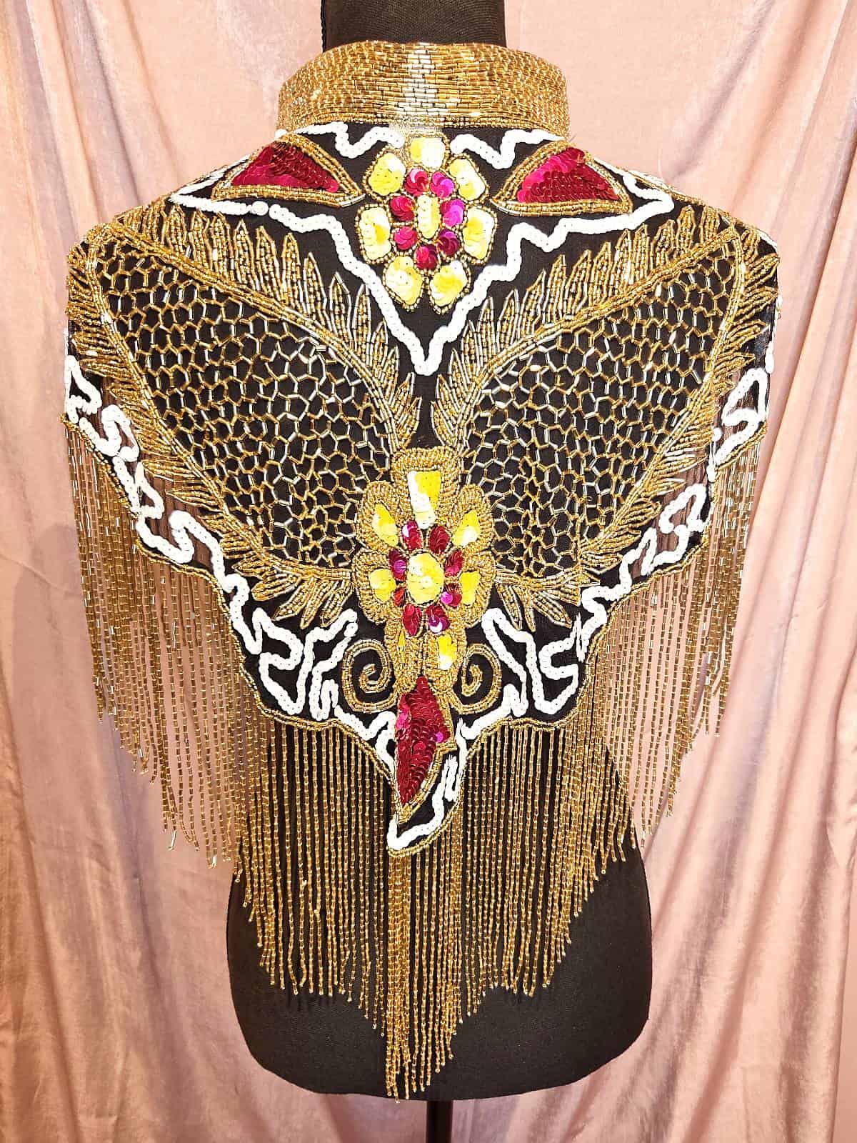 Perlekappe vinger guldpink ryg