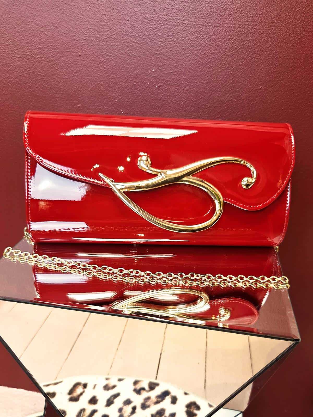 clutch rød guldlukning