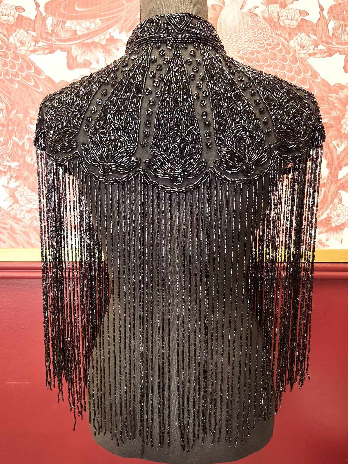 perlekappe sort model 11 ryg