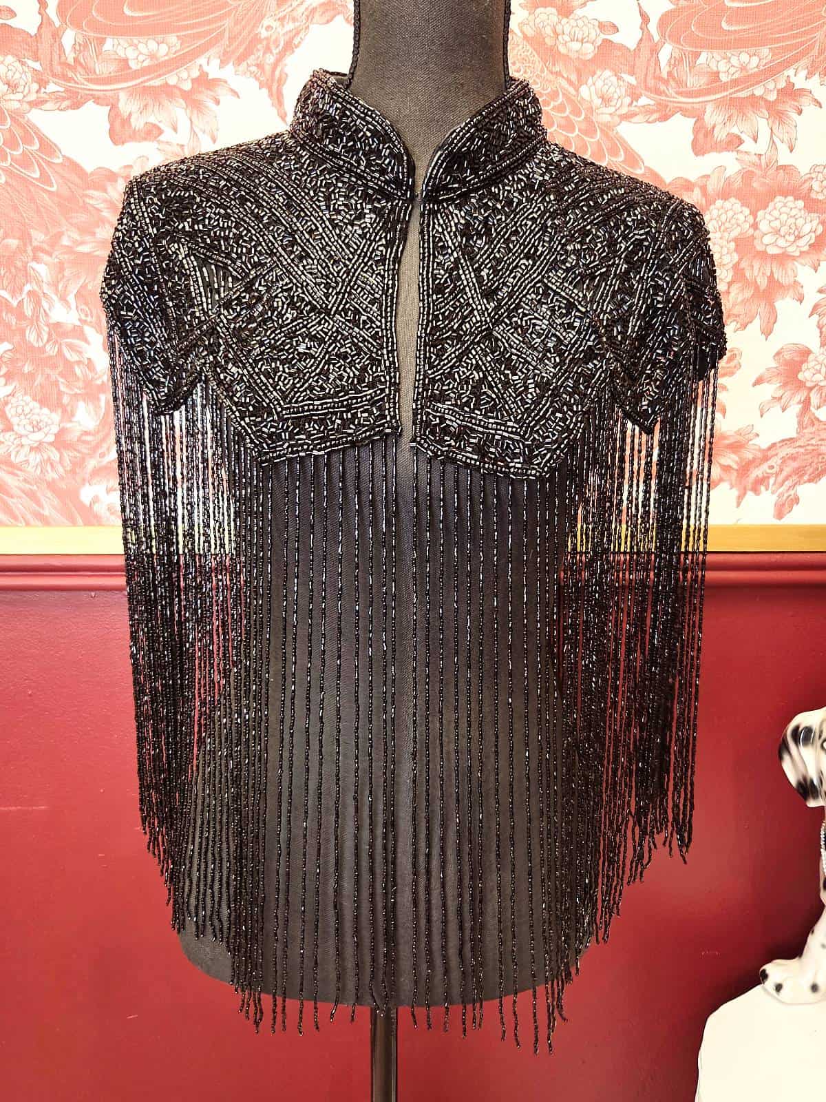 perlekappe sort model 12 front