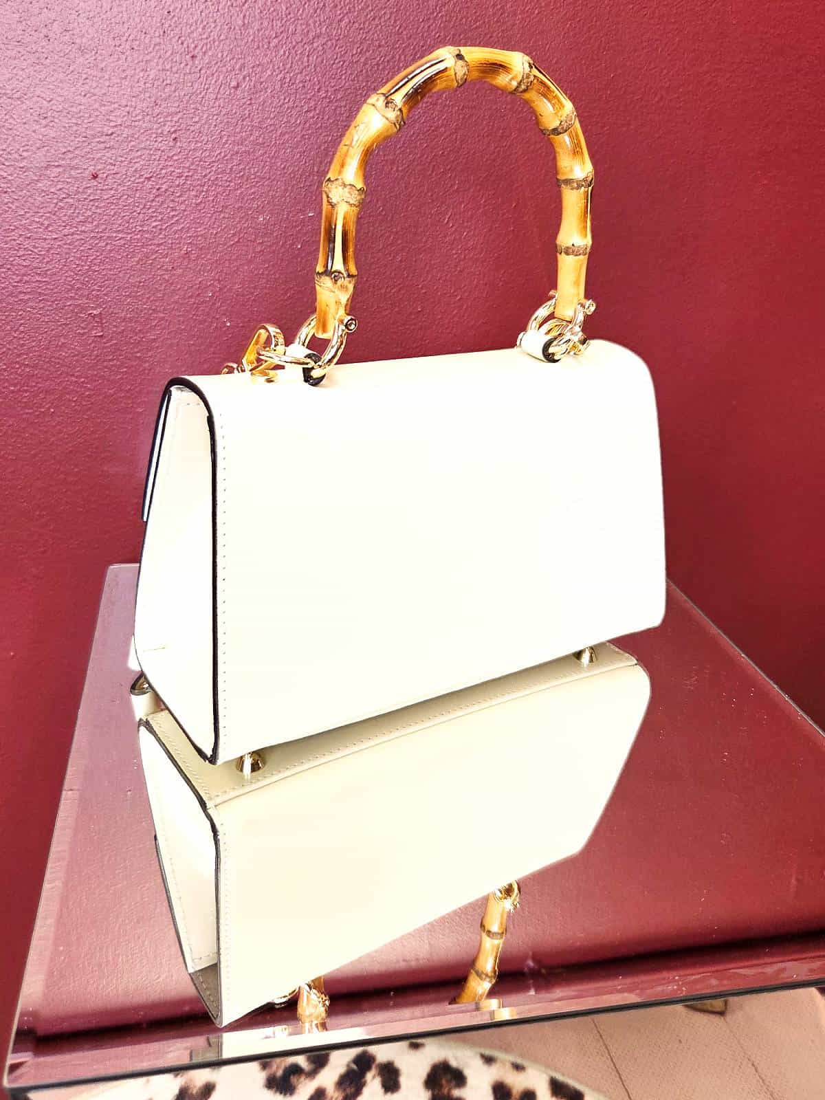 taske bambushank creme i hånd bagside