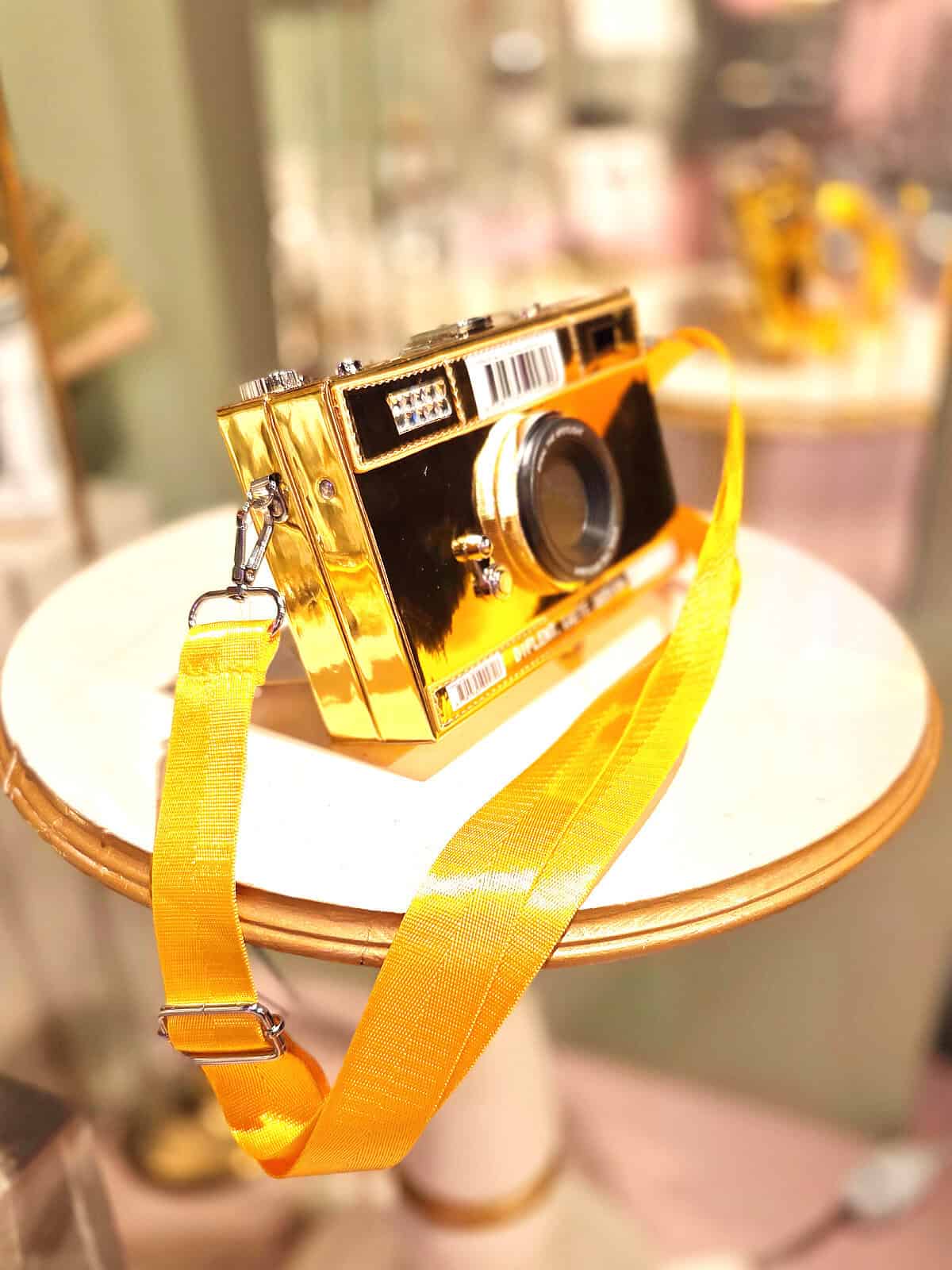 kamera clutch guld - med strop