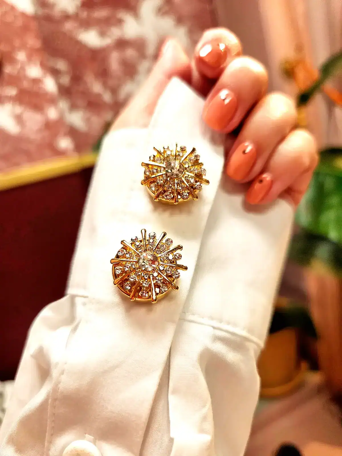 knappecovers guld sol par på ærme