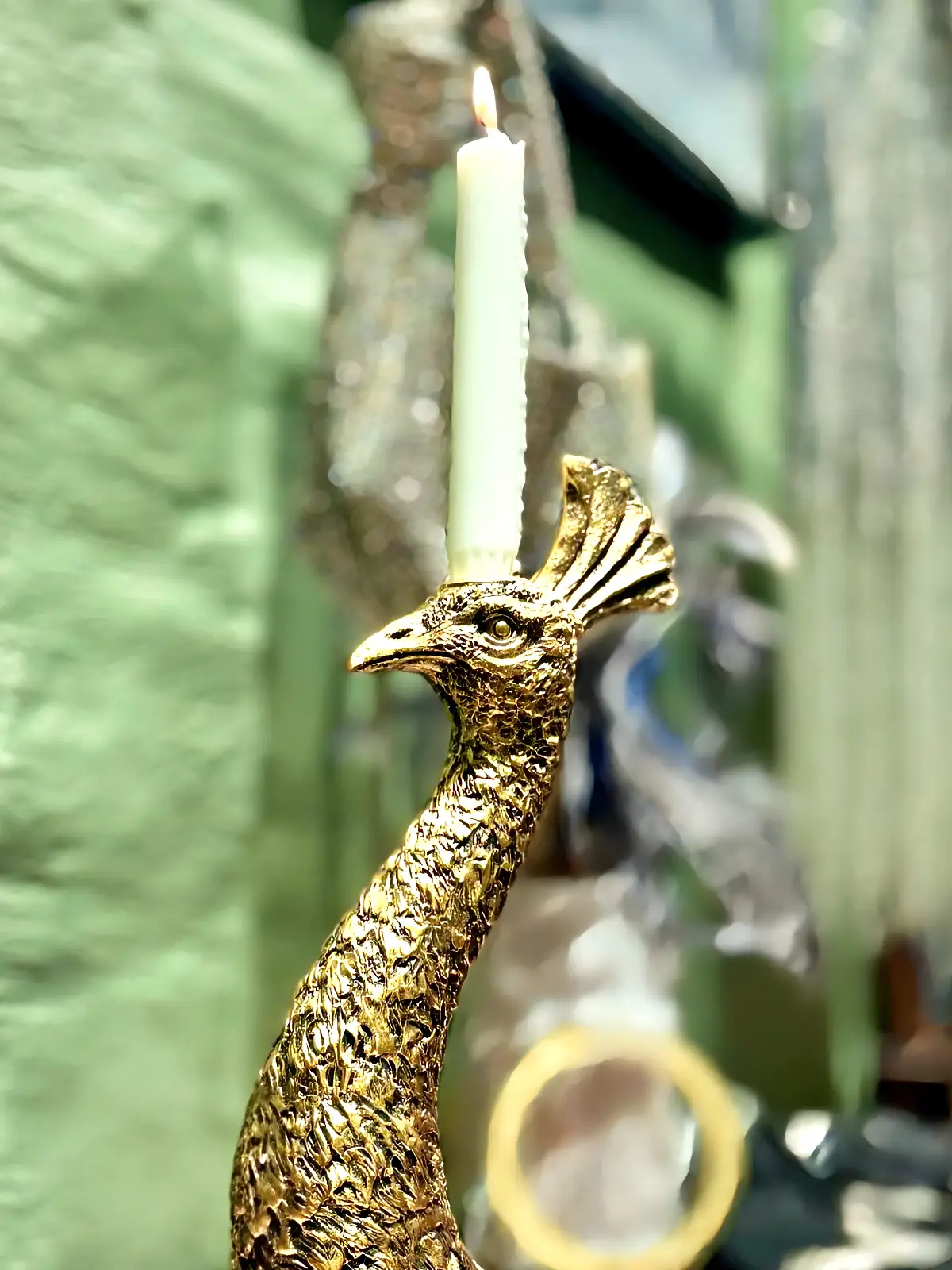 påfugle lysestage med lys