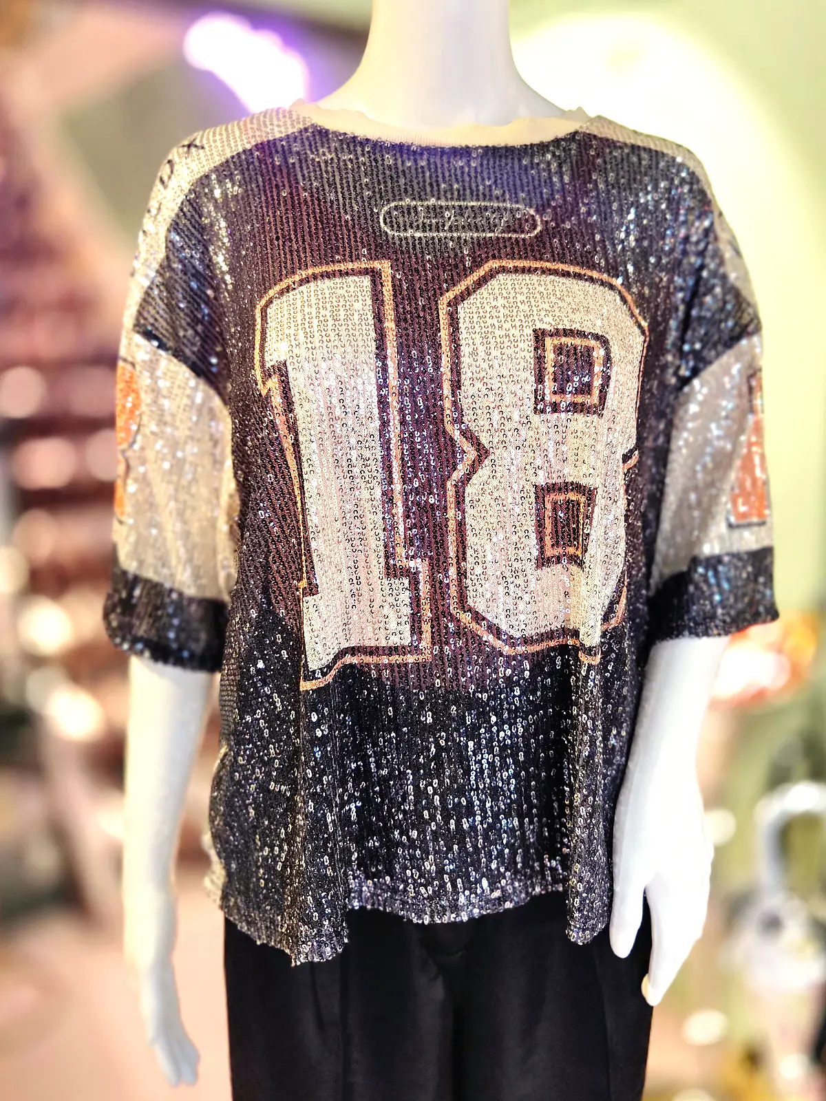 palliet nummer top sort og orange