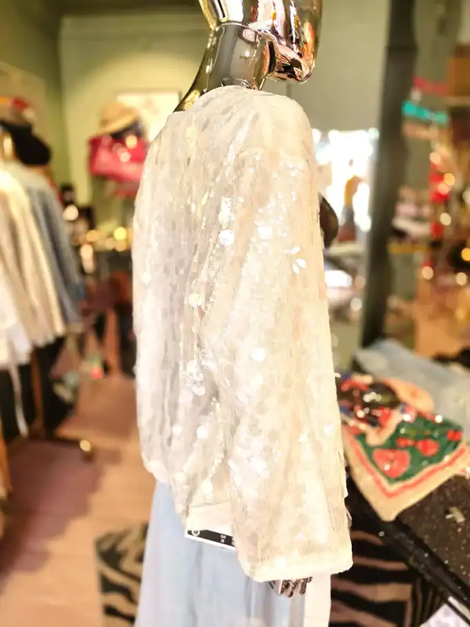 Elegant paillet slå-om cardigan til kvinder, perfekt til festlige anledninger.