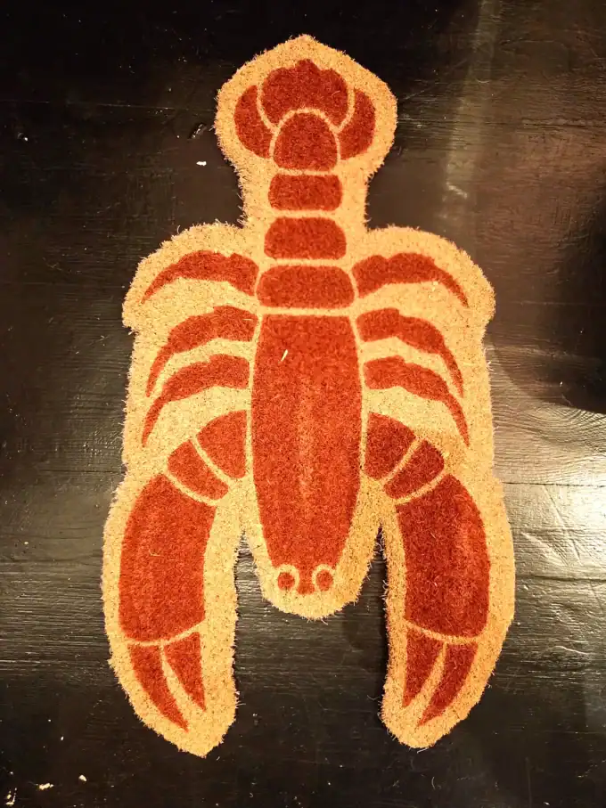 Kokosmåtte med hummermotiv, perfekt til køkken eller badeværelse.